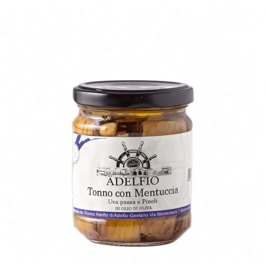 Tonno con mentuccia, uva passa e pinoli in olio di oliva